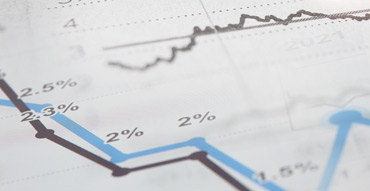 Blue and black line graph displaying rates over time