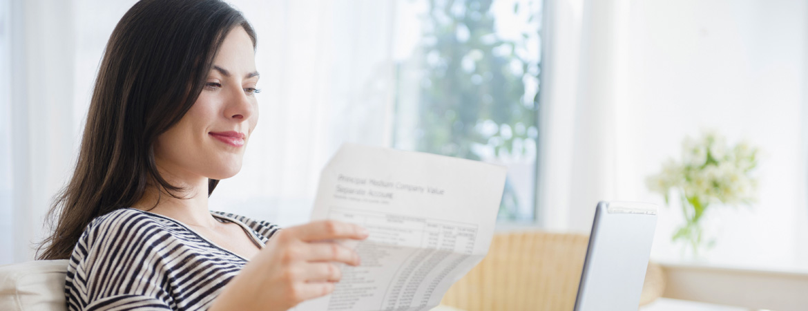 Woman looking at her bills