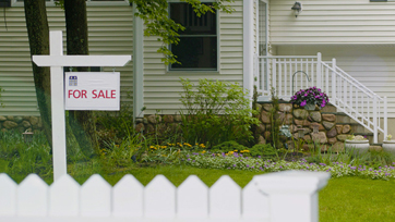 home with for sale sign