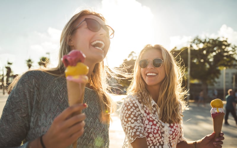 Two friends enjoying ice cream together