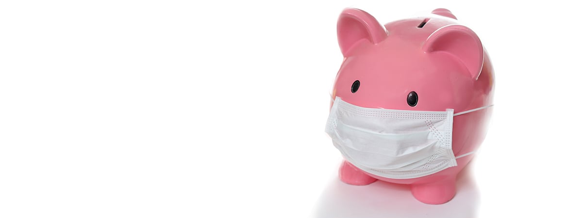 Piggy bank wearing a face mask