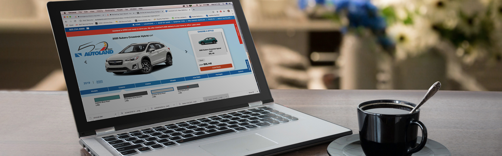 Photo of laptop displaying a car-buying website such as Autoland