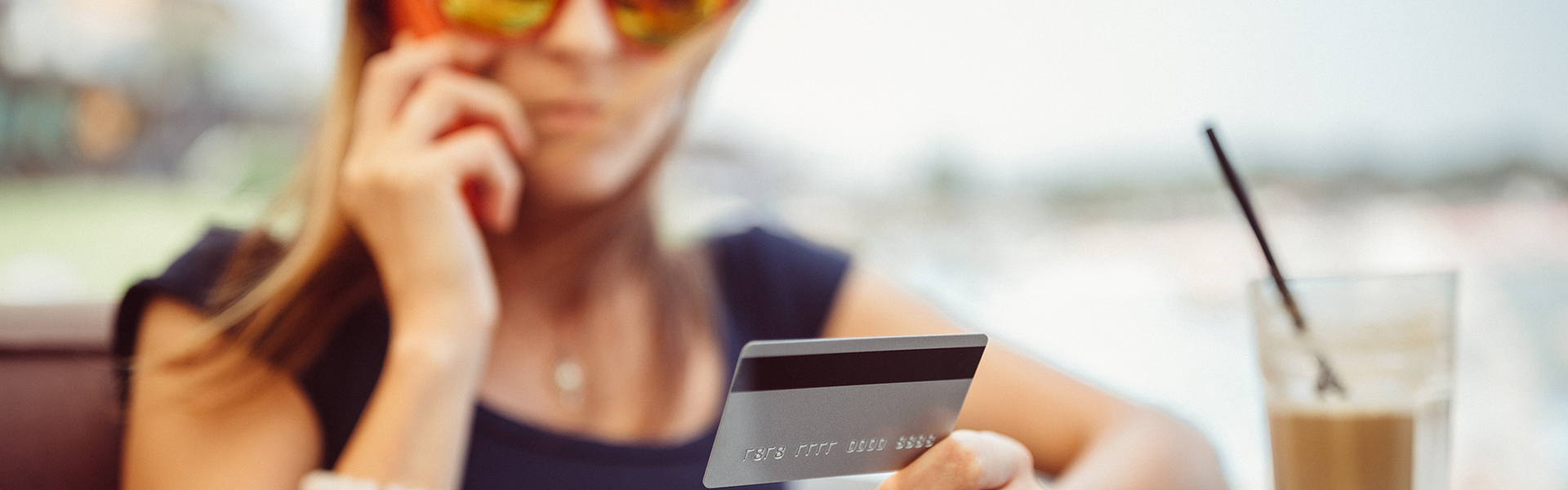 Woman giving out her credit card information over the phone